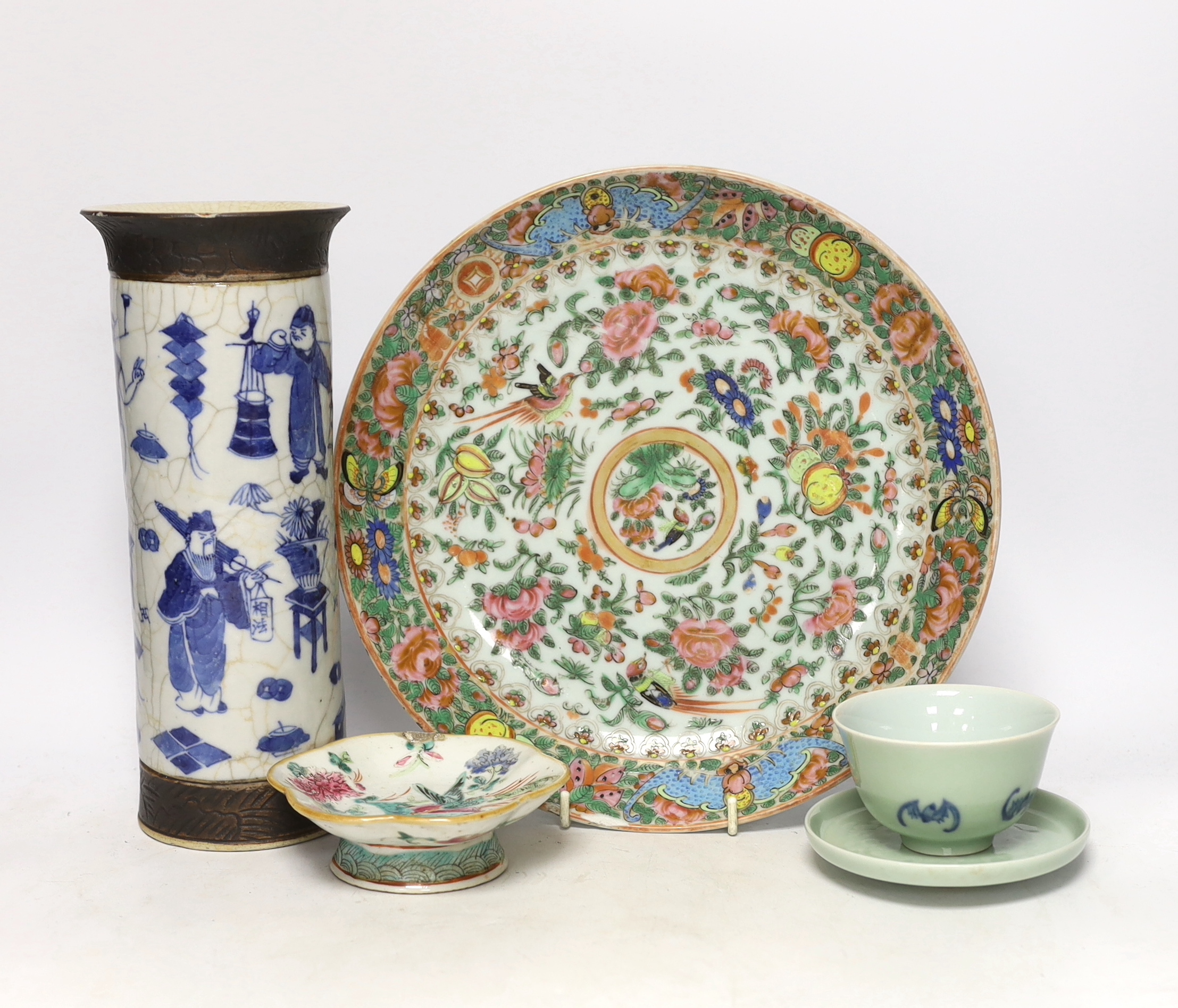 Five Chinese porcelain items including a blue and white crackle glaze cylindrical vase and a celadon glaze tea bowl and stand, largest 29cm in diameter